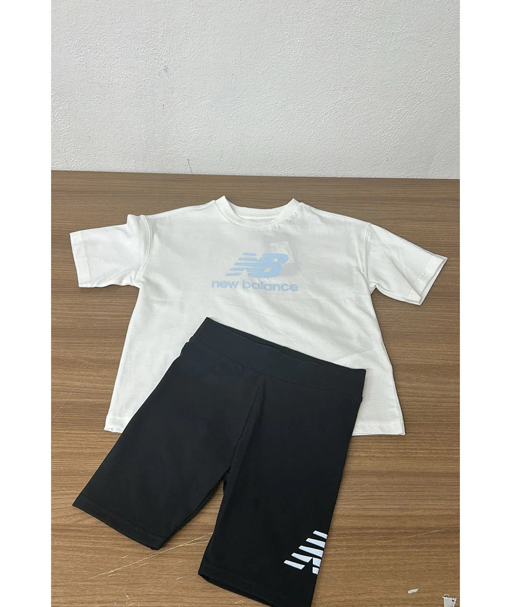 Completino New Balance bimba bianco nero pantaloncino ciclista